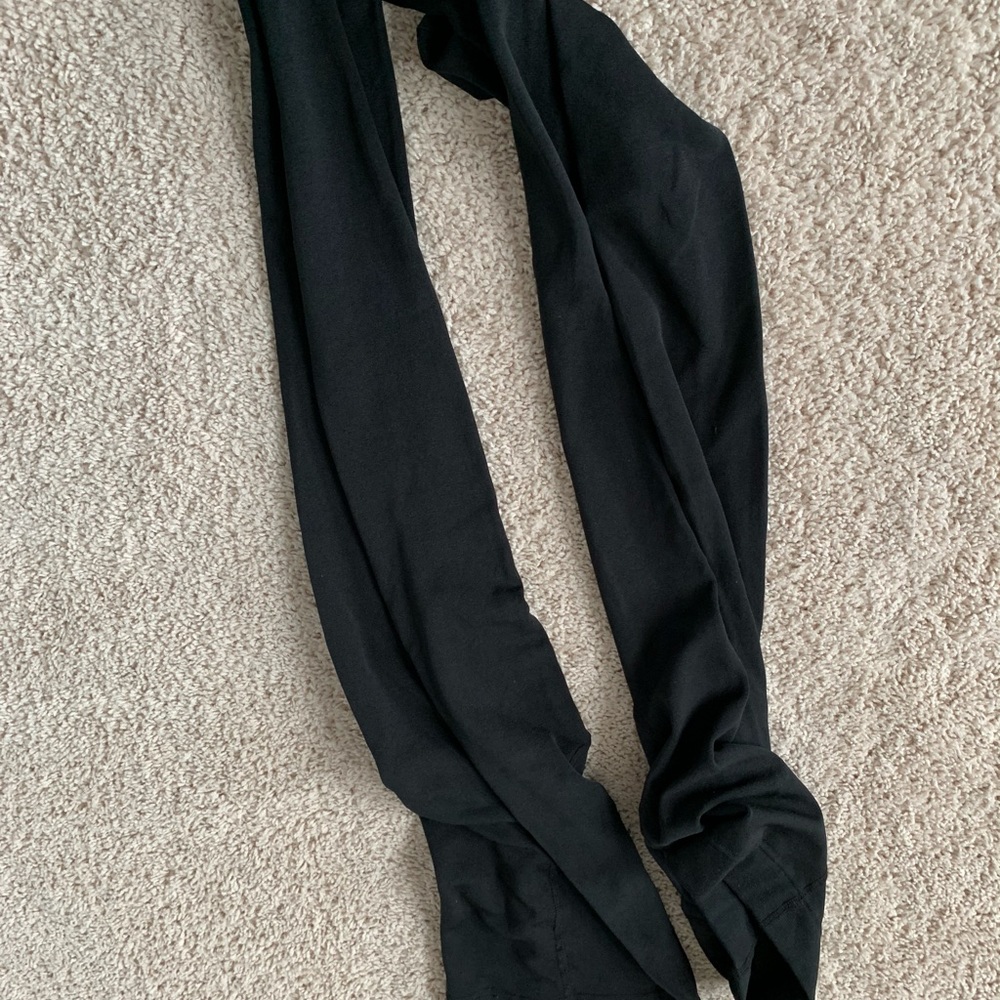 2 pairs of black footed leggings